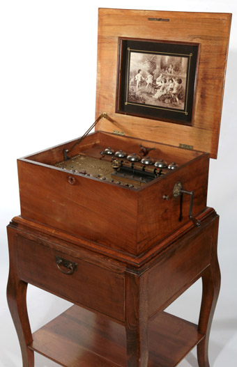 A Rare Polyphon Disc Music Box with 12 Bells and the Original Stand