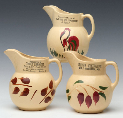 A Collection of Watt Pottery with Advertising