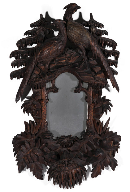 A Circa 1900 Black Forest Carved Mirror