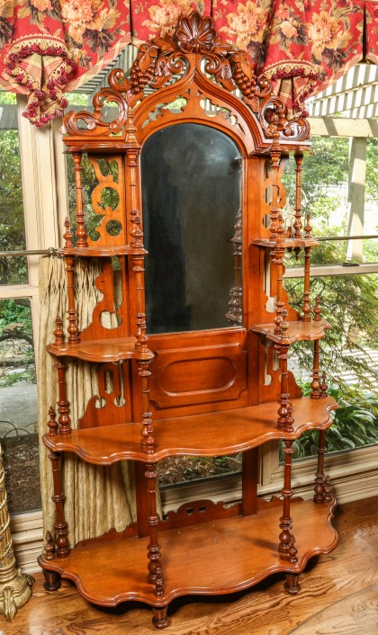 A Fine Etagere with Elaborate Carved Crest