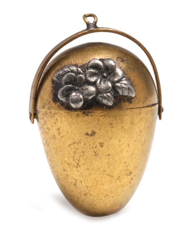 AN ANTIQUE BRASS CHATELAINE THIMBLE HOLDER