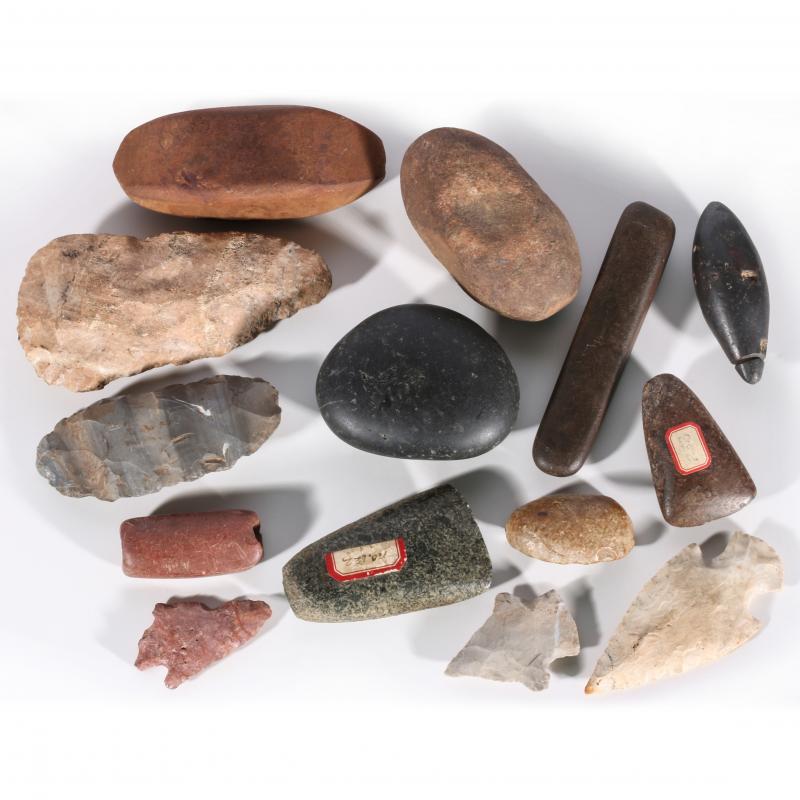 A GROUP OF FOURTEEN MISCELLANEOUS STONE ARTIFACTS