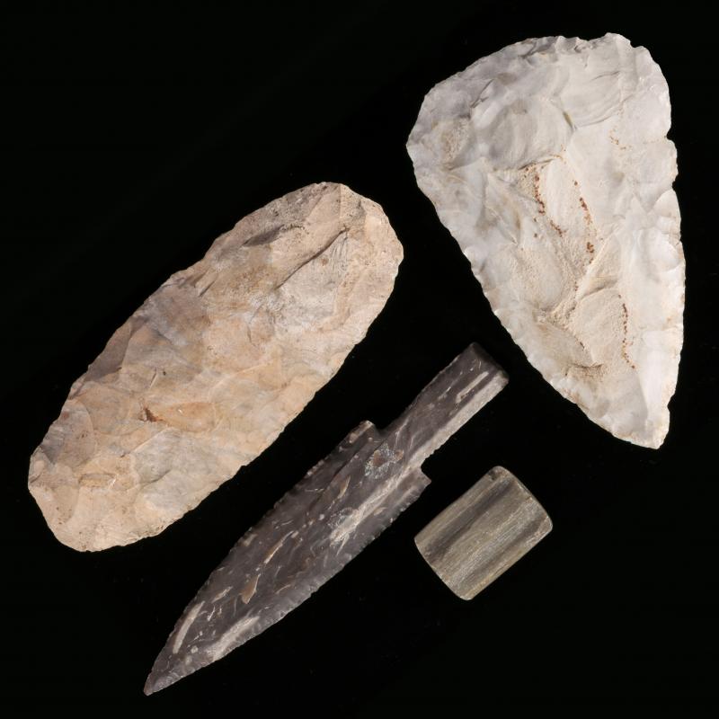 TWO FLINT SPADES OR HOES, PLUS A LONG BLADE