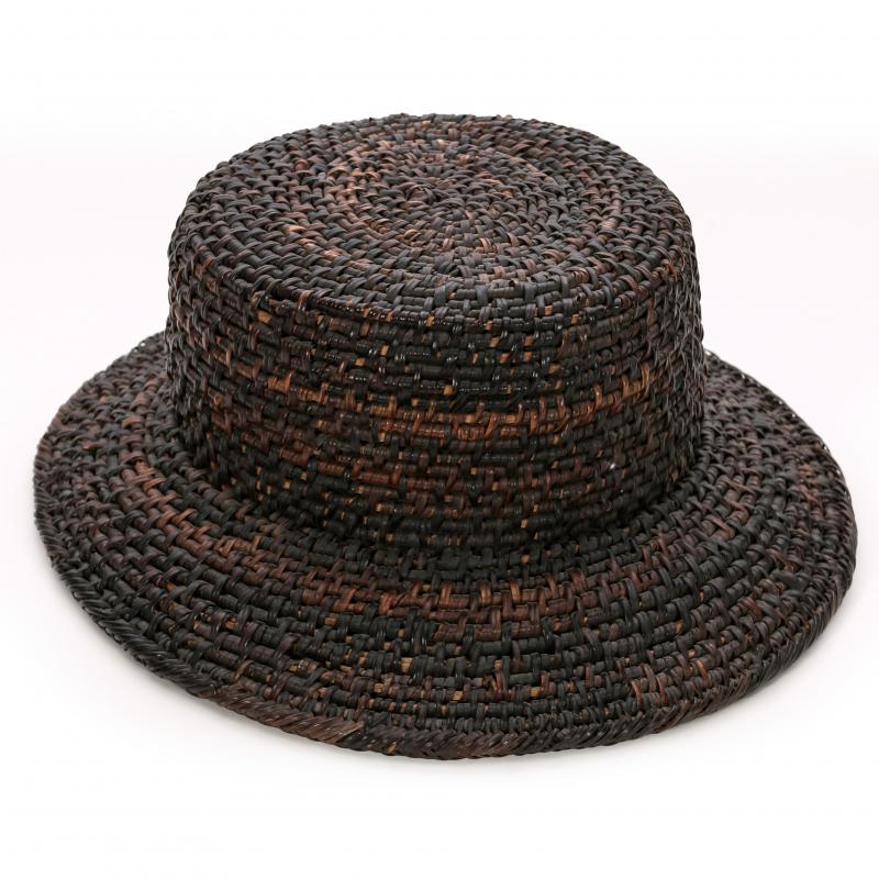 AN INTERESTING NATIVE WOVEN BASKETRY HAT
