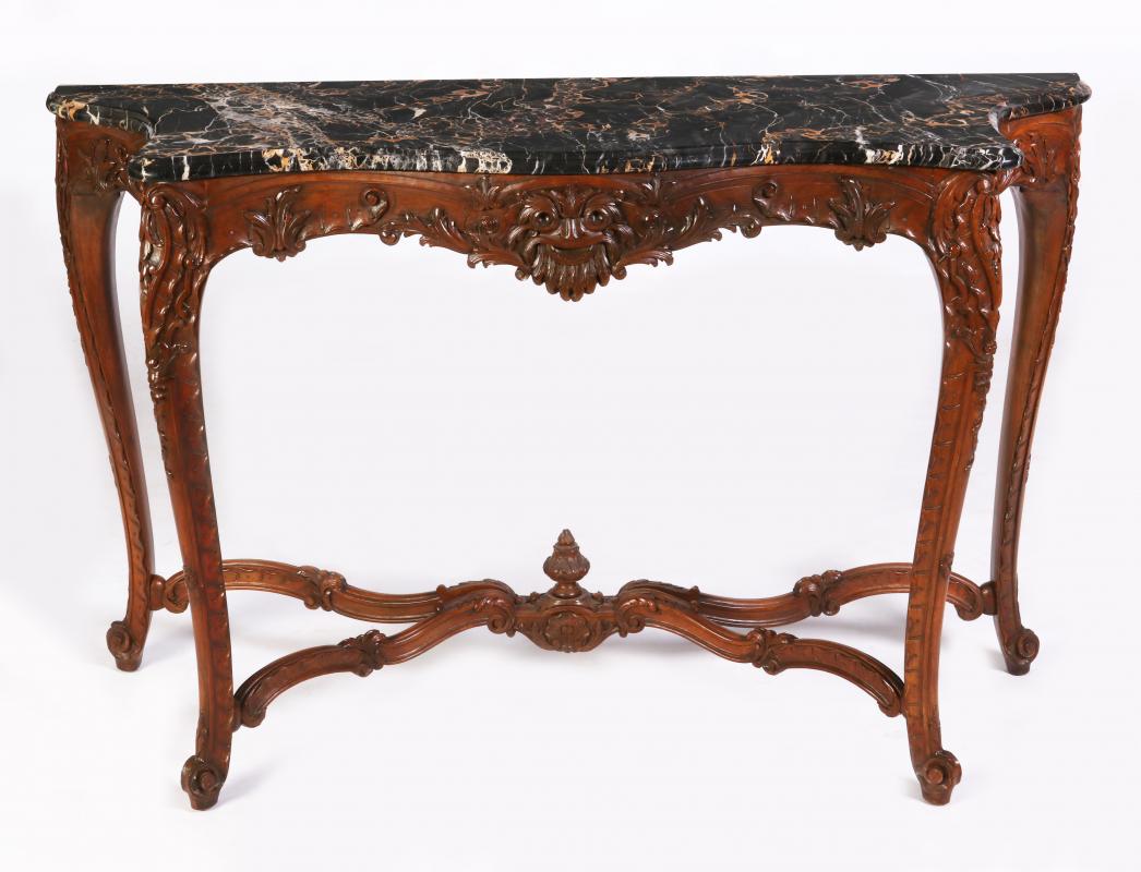 A LOUIS XV STYLE HIGHLY CARVED WALNUT CONSOLE