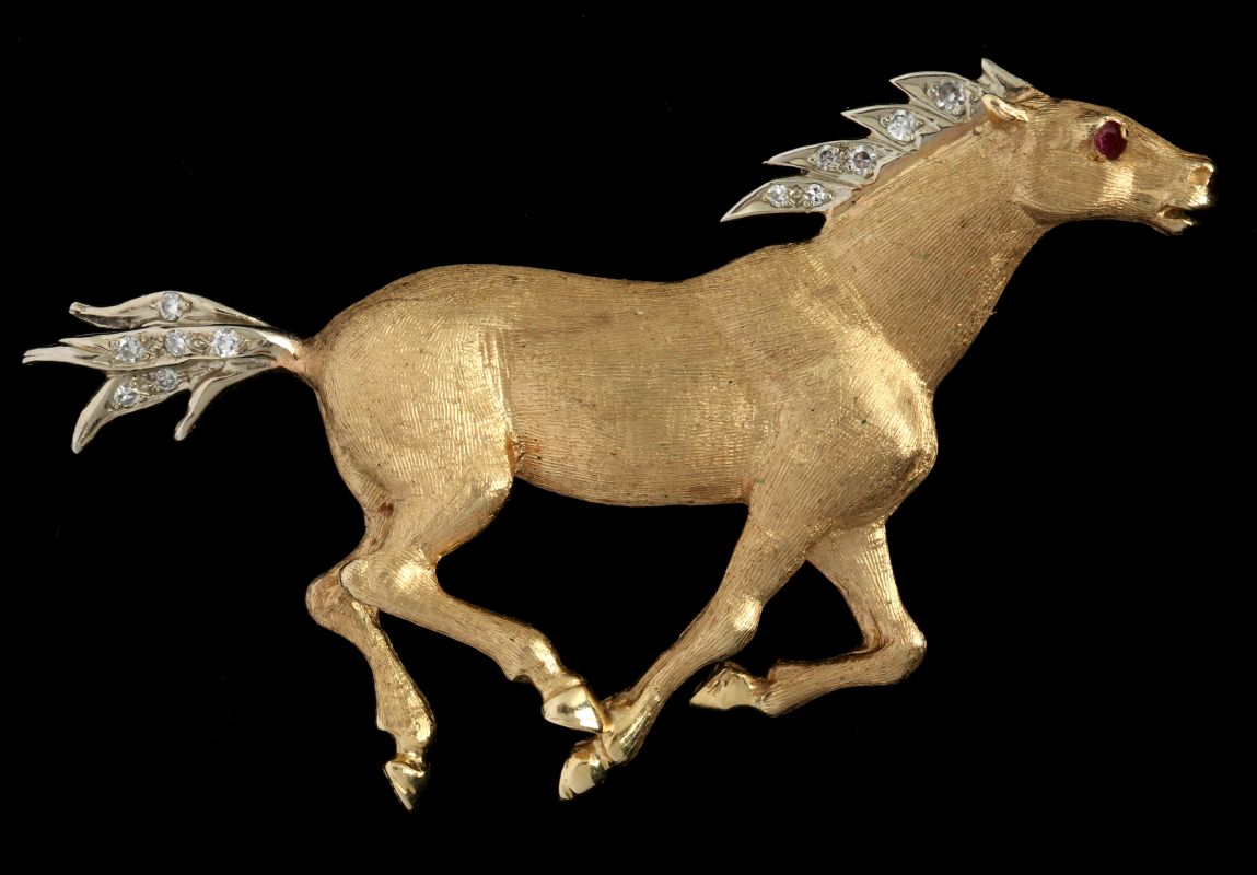 A 14K GOLD DIAMOND AND RUBY FIGURAL HORSE BROOCH