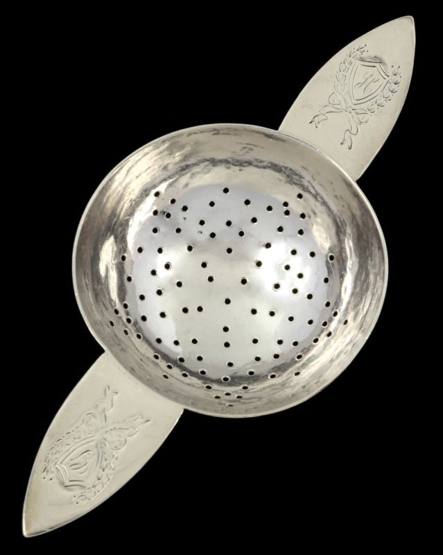 A THEODORE B. STARR HAMMERED STERLING TEA STRAINER