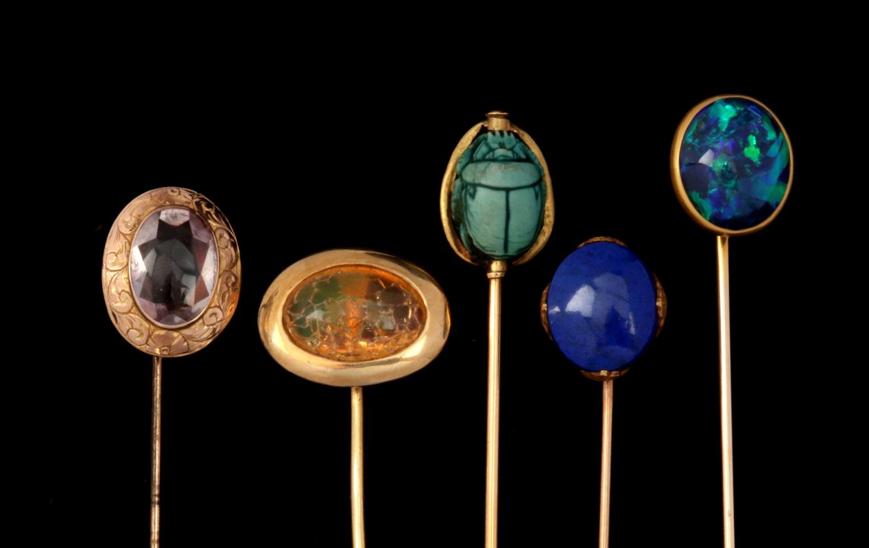 A COLLECTION OF 14K GOLD JEWELED STICK PINS