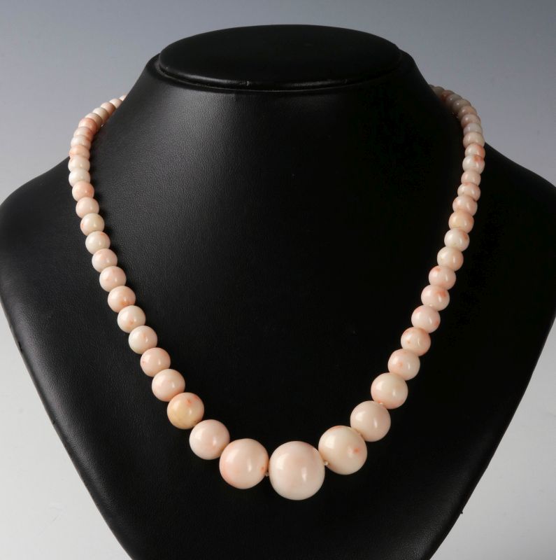 CONCH BEAD NECKLACE WITH 14K SCULPTURAL GOLD CLASP