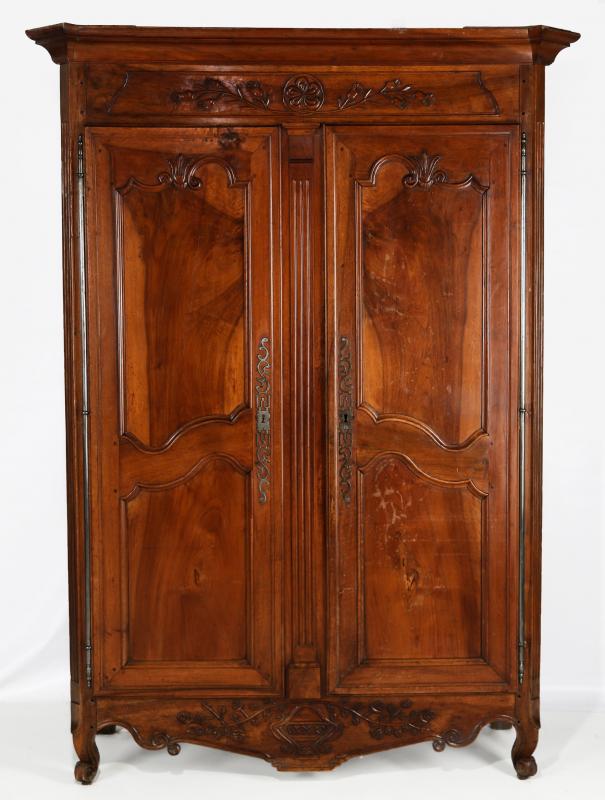 AN EARLY 19TH CENTURY FRENCH TWO DOOR ARMOIRE