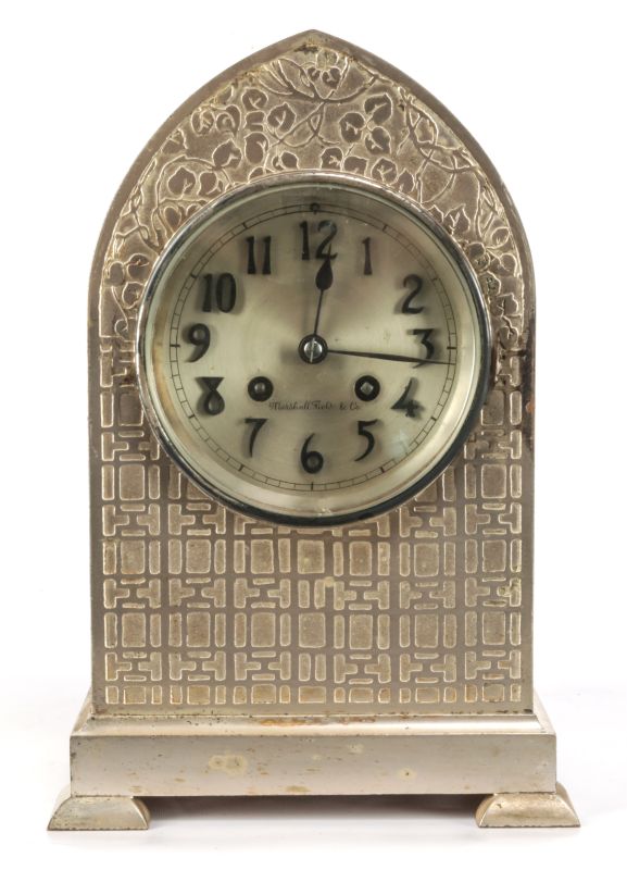 A SILVERED FRENCH GOTHIC FORM CLOCK SIGNED H & H 