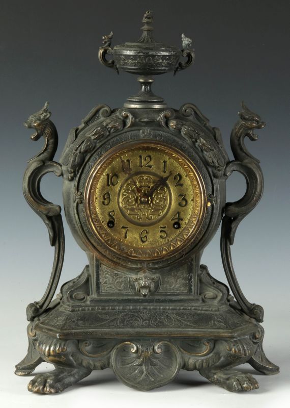 A CIRCA 1890 AMERICAN SPELTER CLOCK WITH GRIFFONS