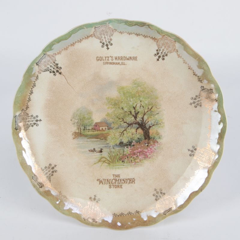 A VINTAGE WINCHESTER HARDWARE ADVERTISING PLATE