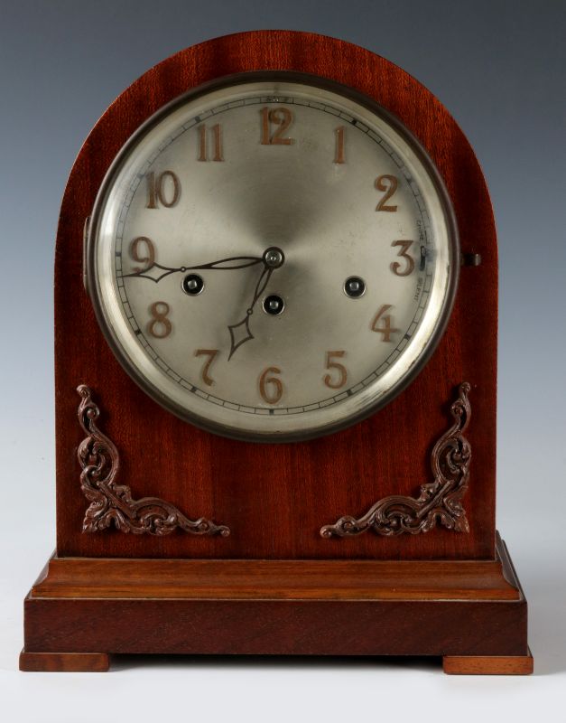 A JUNGHANS BEEHIVE CLOCK WITH APPLIED CARVINGS