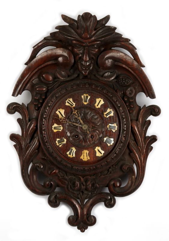 AN INTERESTING C. 1890 CONTINENTAL CARVED OAK CLOCK