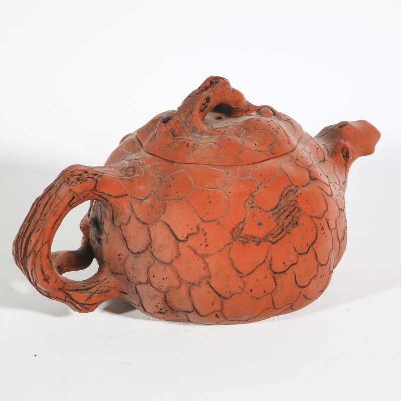 A CHINESE LATE QING YIXING POTTERY TEAPOT