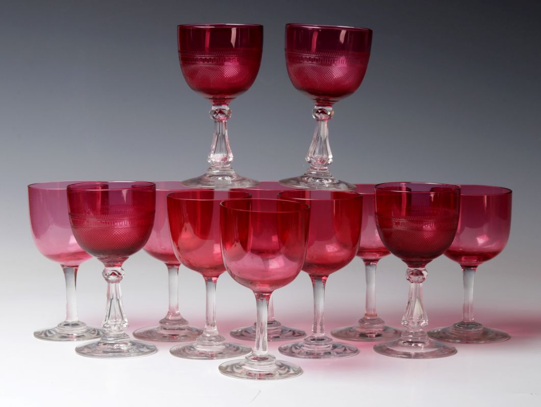 TWELVE VARIOUS ANTIQUE CRANBERRY GLASS WINES