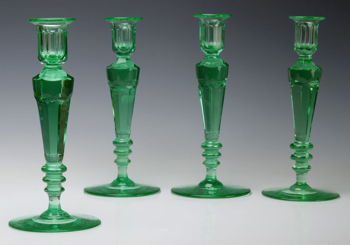FOUR POLISHED GREEN CRYSTAL GLASS CANDLESTICKS 