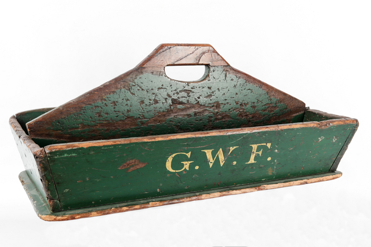 A 19TH CENTURY CARPENTER'S TOTE IN OLD GREEN PAINT