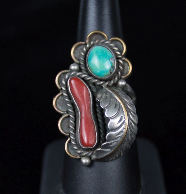 A NAVAJO STERLING, TURQUOISE AND CORAL RING