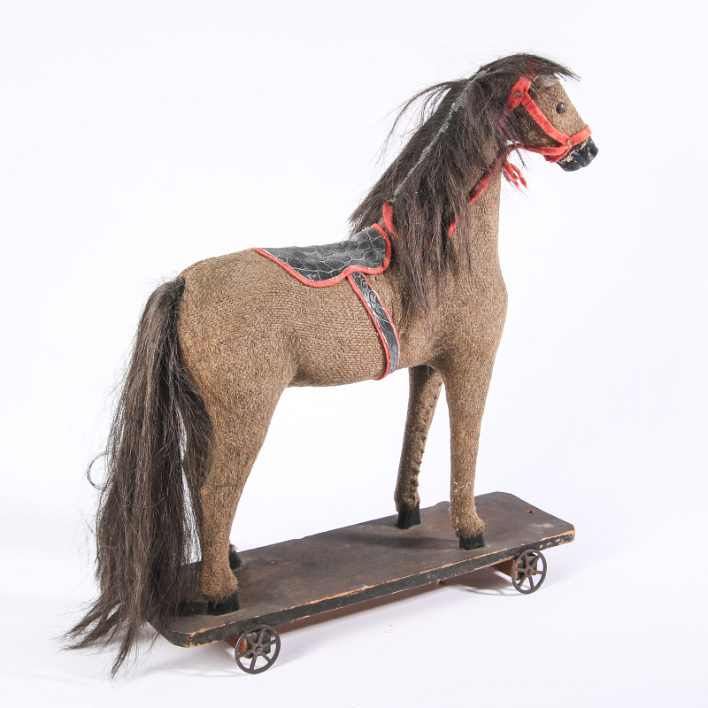 A CLASSIC LATE 19TH CENTURY PLATFORM HORSE
