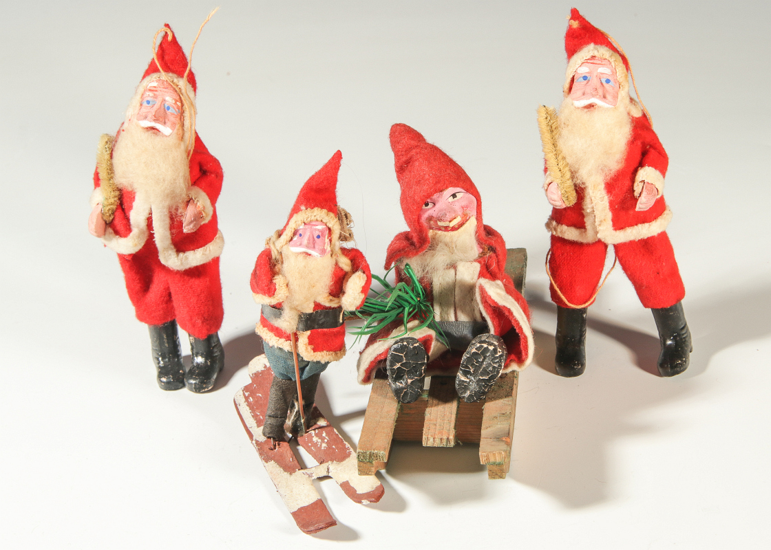 A COLLECTION OF FOUR CA. 1920 SANTA CLAUS FIGURES