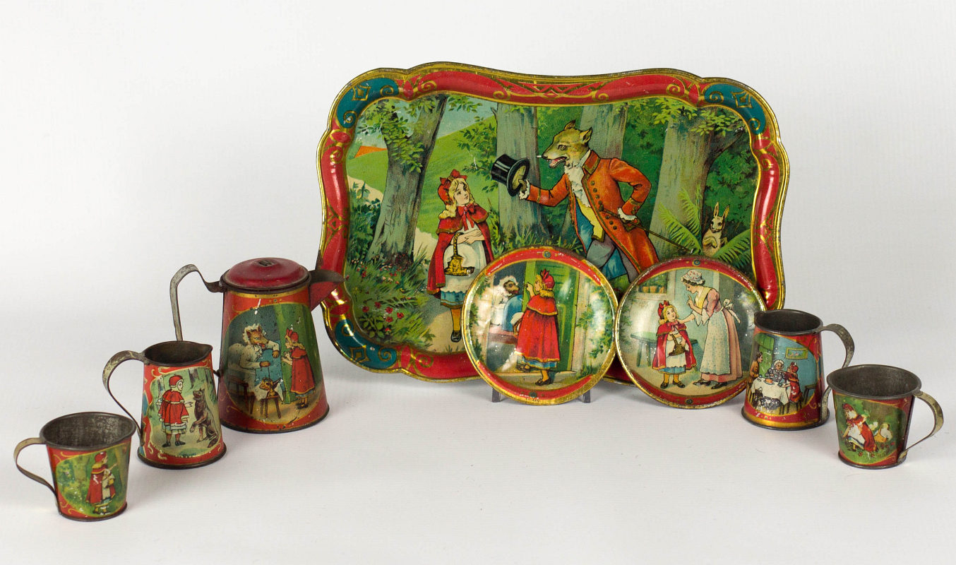 A CHILD'S TIN LITHO TEA SET WITH RED RIDING HOOD