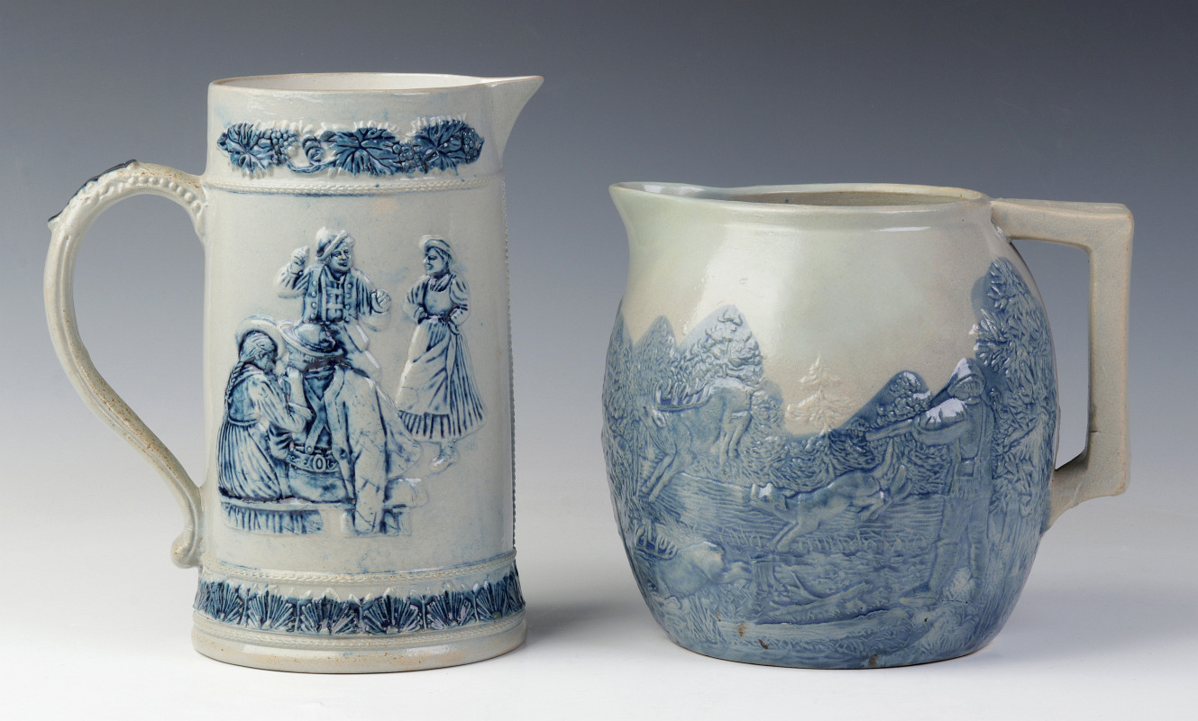 TWO BLUE AND WHITE FLEMISH WARE STONEWARE PITCHERS