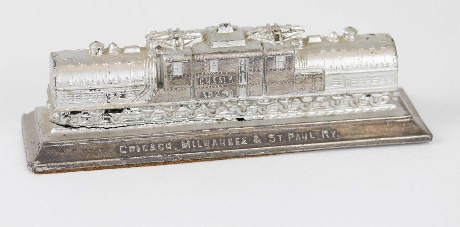 C.M. & St. P. RAILROAD ADVERTISING PAPERWEIGHT