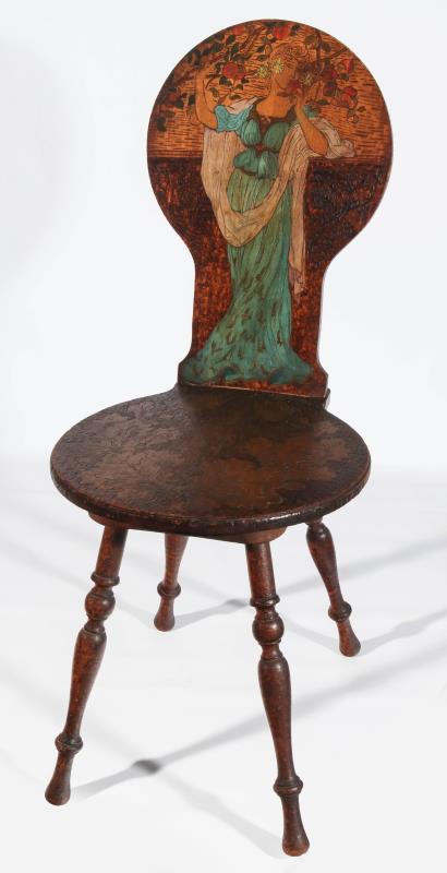 A CIRCA 1910 PYROGRAPHY DECORATED CHAIR AFTER MUCH