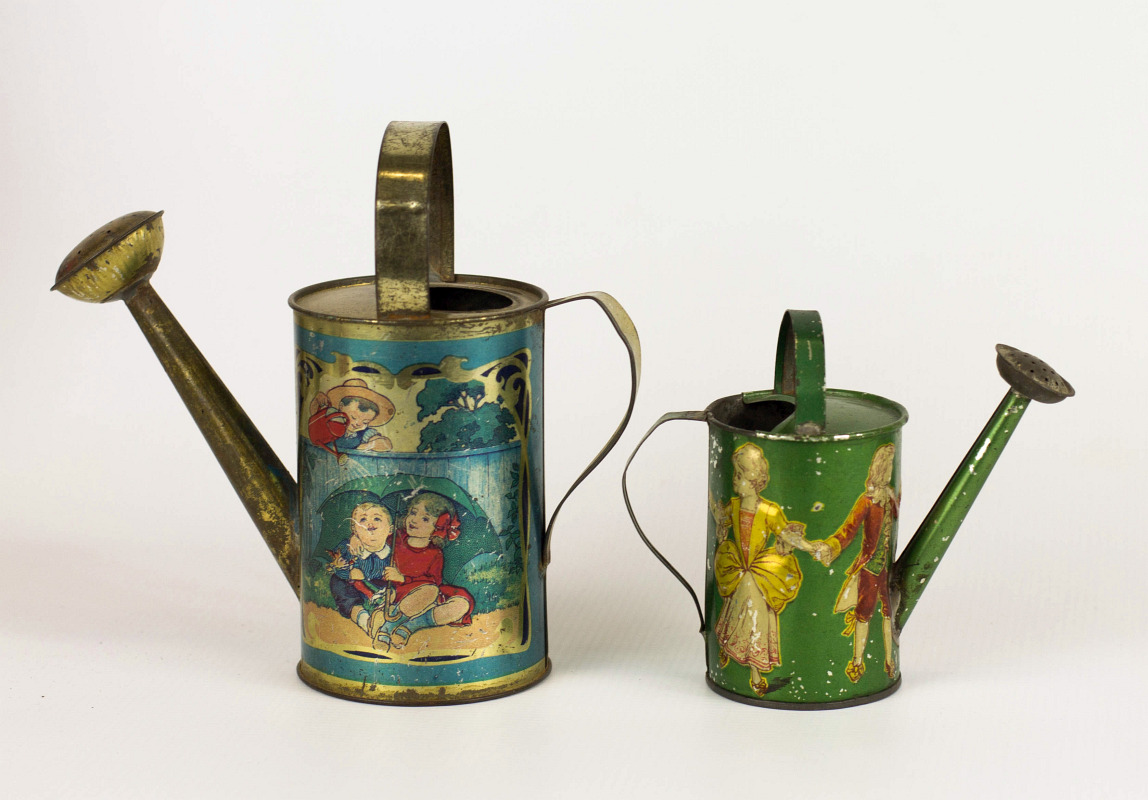 TWO CHILDREN'S TIN LITHO WATERING CANS