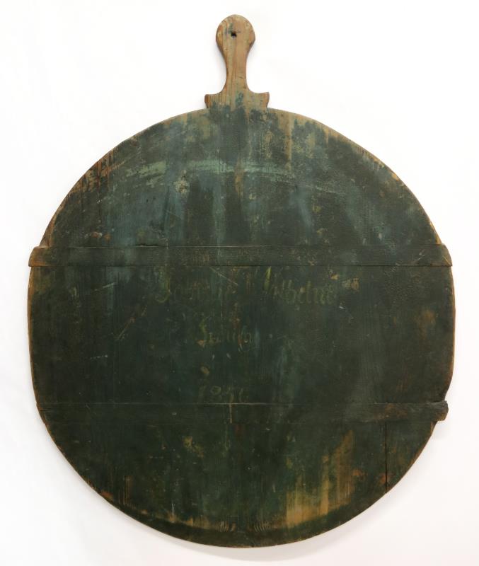 AN 1856 CIRCULAR BREAD BOARD IN OLD GREEN PAINT