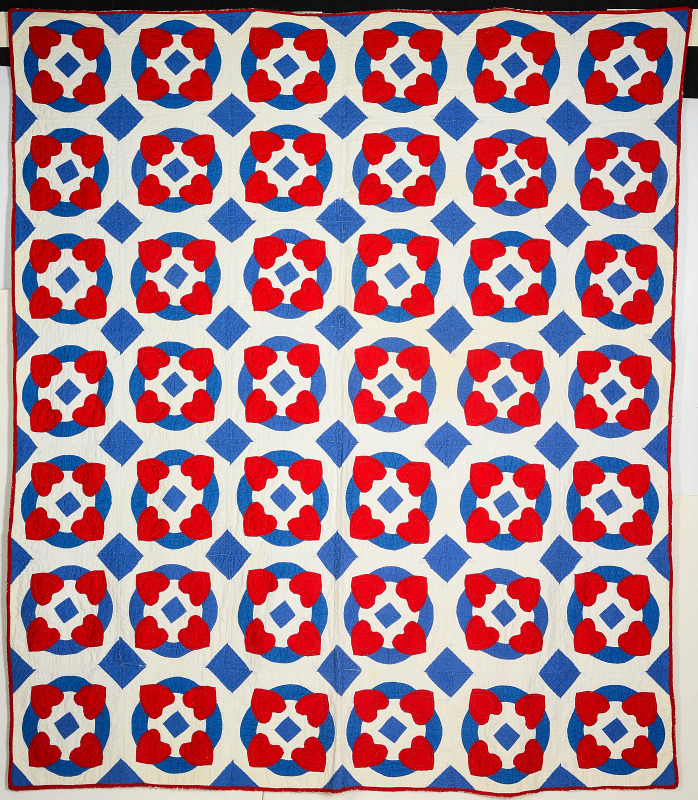VINTAGE RED, WHITE AND BLUE APPLIQUE HEARTS QUILT
