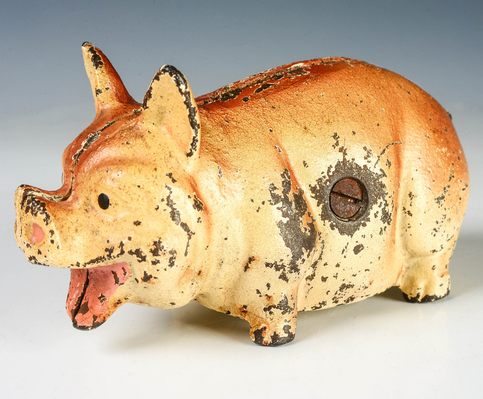 AN EARLY 20TH CENTURY CAST IRON PIG FIGURAL BANK