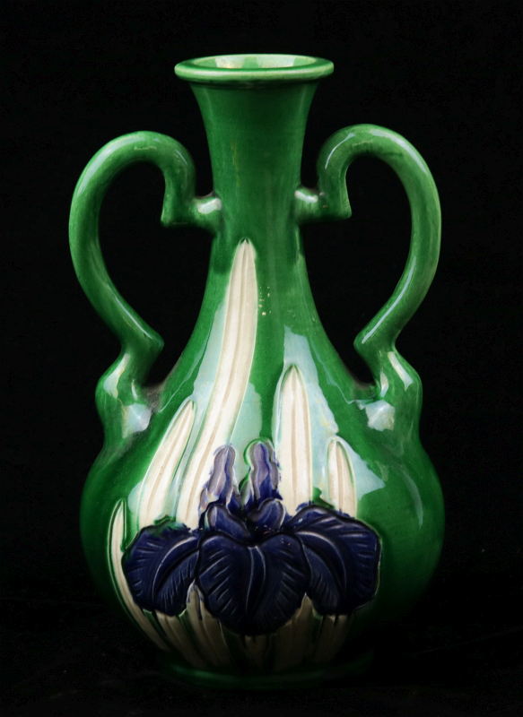 A JAPANESE AWAJI POTTERY VASE WITH CARVED IRIS