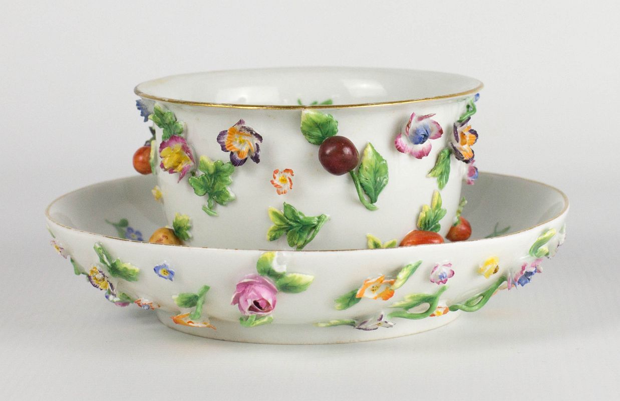 A MEISSEN FRUIT AND FLOWER BOWL WITH UNDERPLATE
