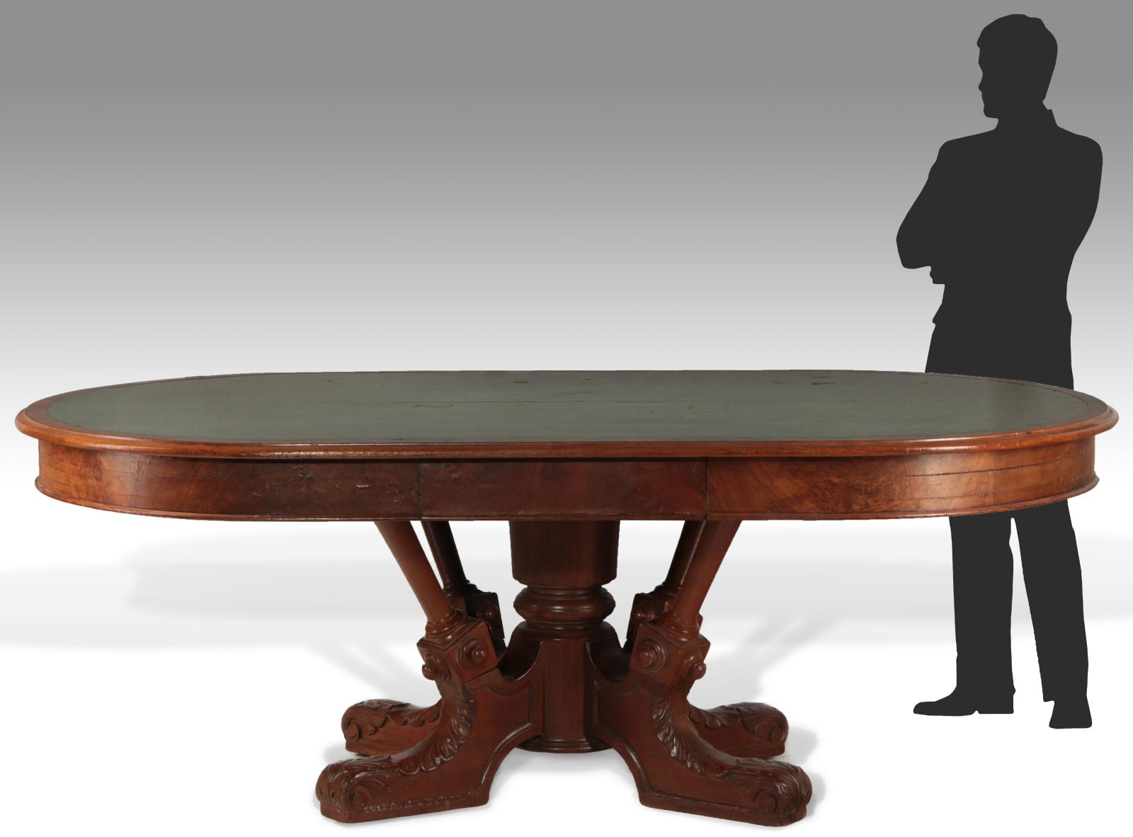 A MASSIVE 19TH C. AMERICAN OVAL LIBRARY TABLE