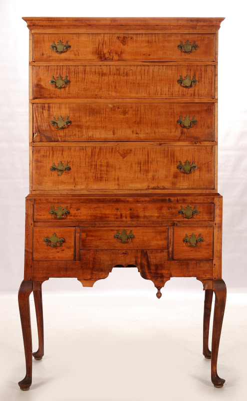 AN EARLY 19TH CENTURY AMERICAN TIGER MAPLE HIGHBOY