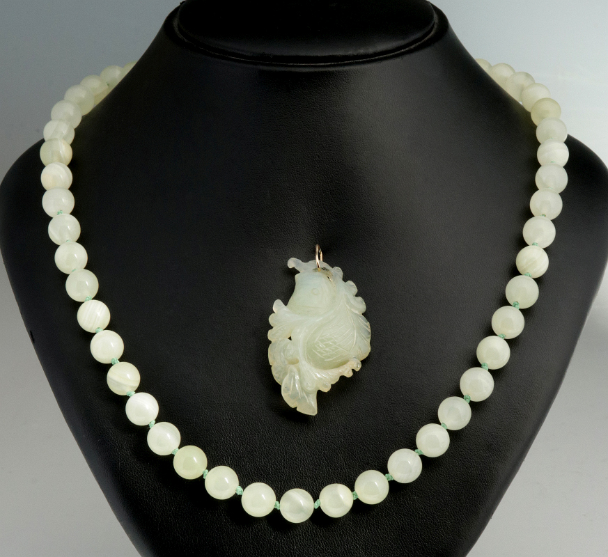 CARVED JADE FISH PENDANT WITH A JADE BEAD NECKLACE