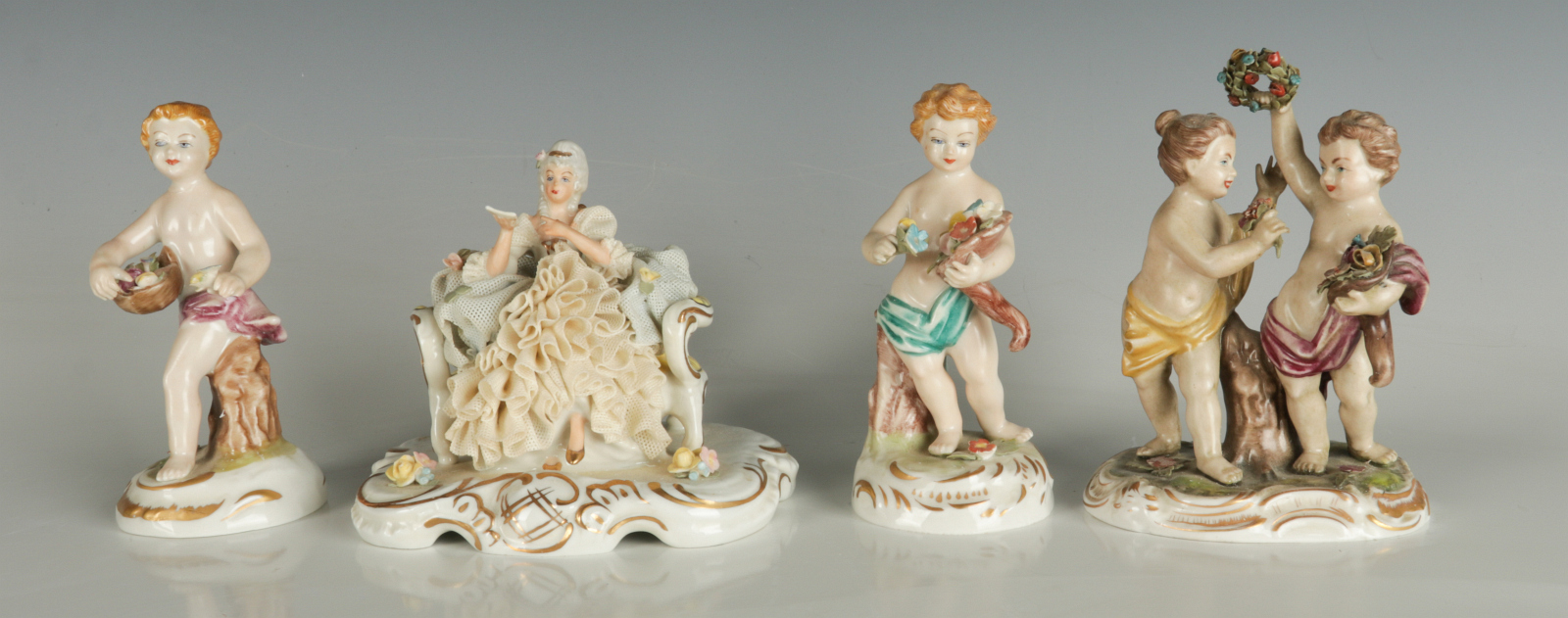 A COLLECTION OF EARLY 20TH C. PORCELAIN FIGURES