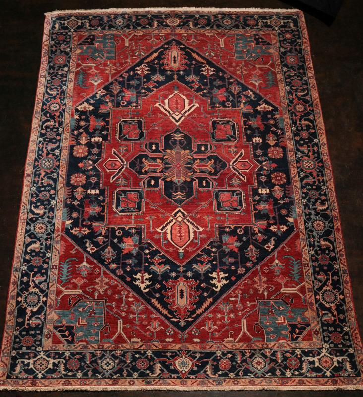 AN EARLY TO MID 20TH CENTURY HERIZ ROOM SIZE CARPET
