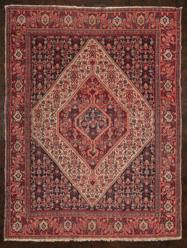 AN ANTIQUE PERSIAN SENNEH SCATTER RUG 