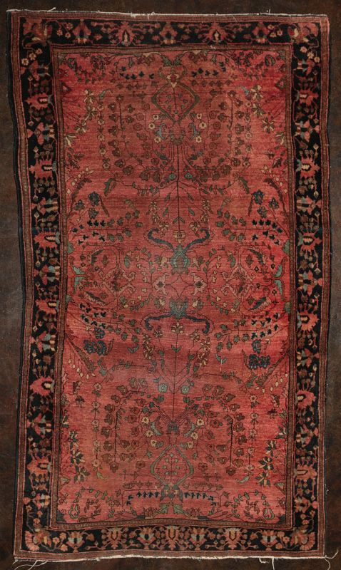AN EARLY 20TH CENTURY PERSIAN SAROUK SCATTER RUG