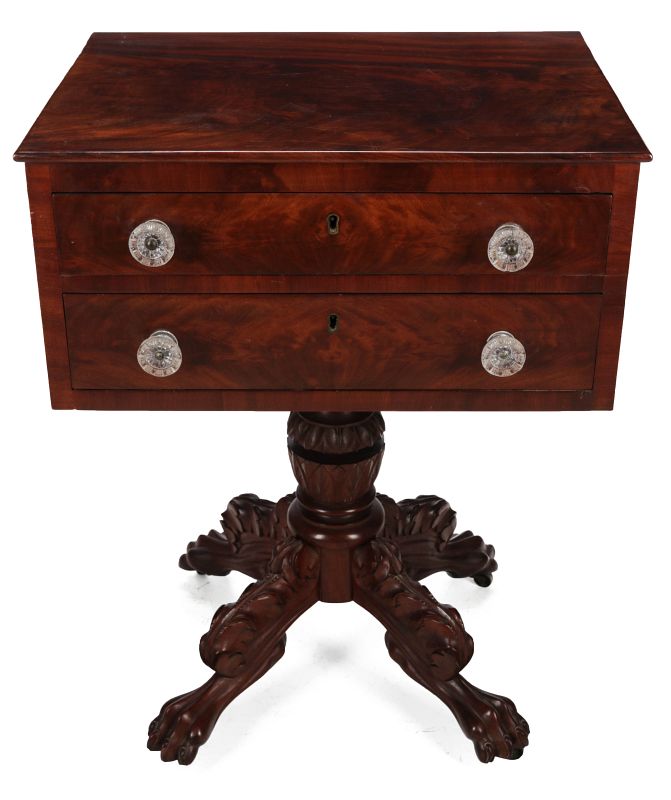 AN AMERICAN EMPIRE TWO-DRAWER FLAME MAHOGANY STAND