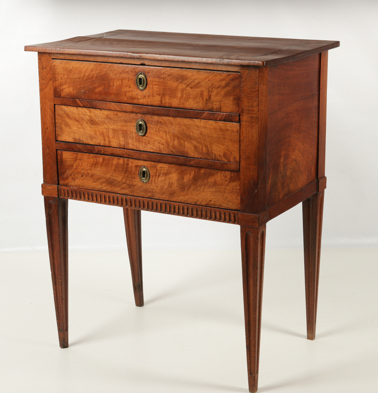 A FRENCH DIRECTOIRE THREE DRAWER WALNUT STAND