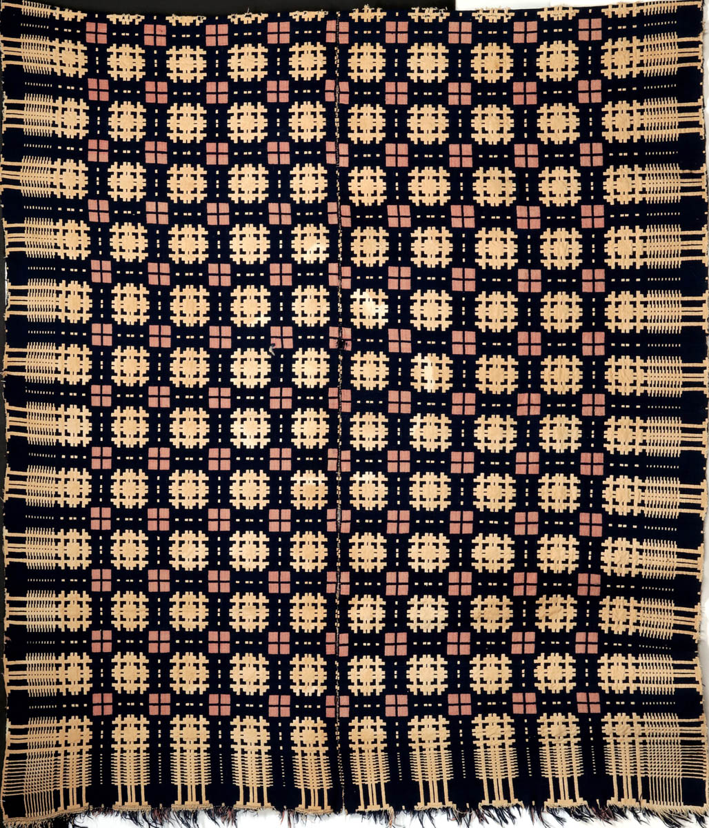 A 19TH C. SNOWFLAKE PATTERN DOUBLE WEAVE COVERLET