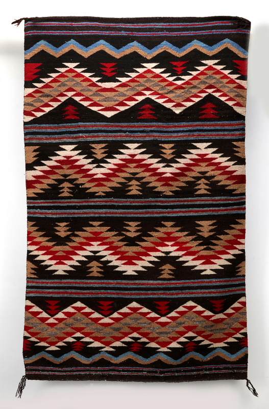 A LATE 20TH CENTURY NAVAJO SADDLE BLANKET