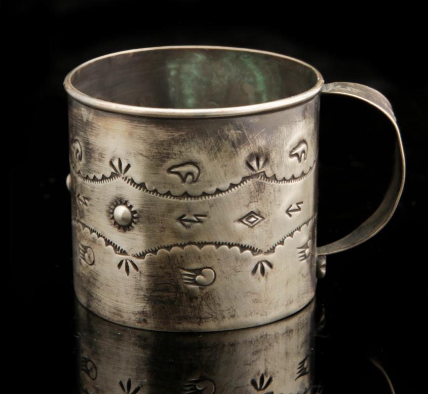 A NAVAJO STERLING CHILD'S CUP SIGNED JULIA SMITH