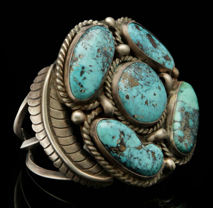 A LARGE NAVAJO STERLING AND TURQUOISE MEN'S CUFF