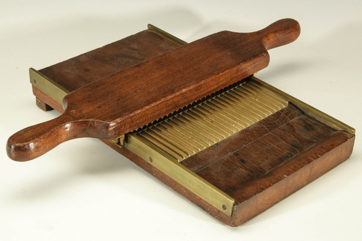 A 19TH C. BRASS AND MAHOGANY PILL ROLLER /PRESS